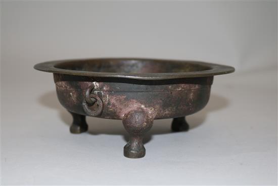 A Chinese archaic bronze tripod vessel, 15.5cm